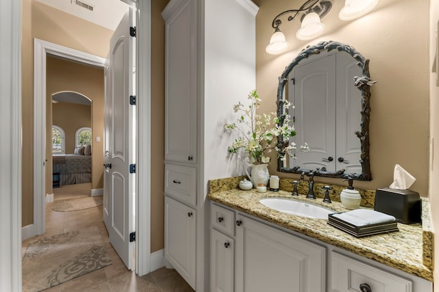 bathroom featuring vanity and tile patterned flooring