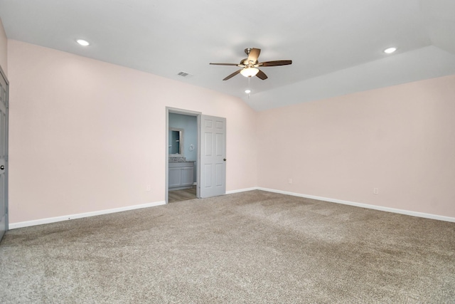 spare room with carpet flooring, ceiling fan, and lofted ceiling