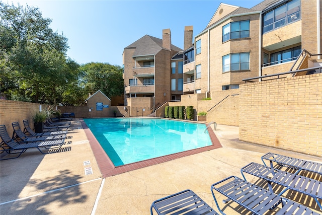 view of pool with a patio area