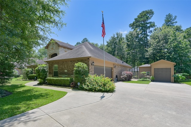 view of property exterior featuring a lawn