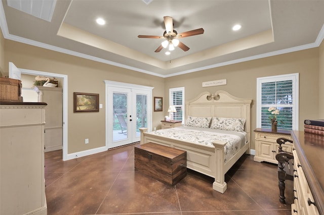 bedroom featuring a raised ceiling, ceiling fan, access to exterior, ornamental molding, and french doors