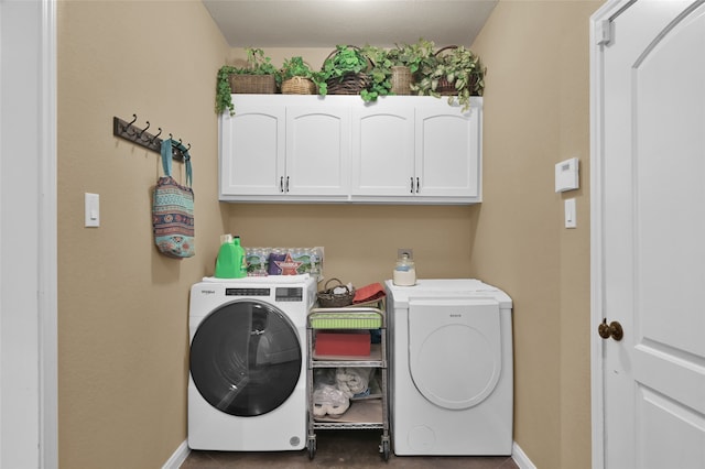 laundry room with cabinets