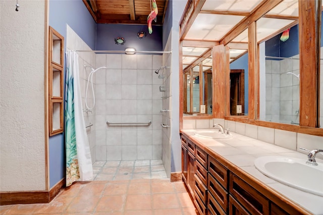 bathroom featuring vanity, curtained shower, and wood ceiling