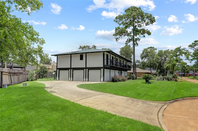 view of home's exterior with a yard and a garage