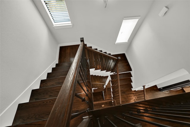 staircase featuring plenty of natural light