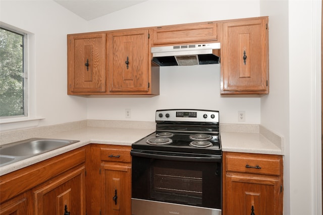 kitchen with vaulted ceiling and stainless steel electric range