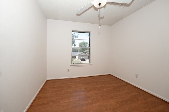 unfurnished room with hardwood / wood-style floors and ceiling fan