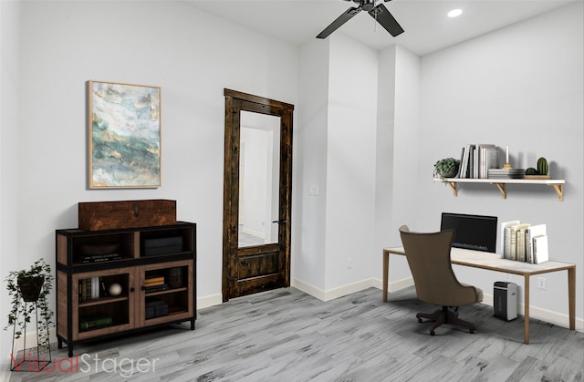 office area with ceiling fan and light wood-type flooring