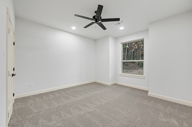 carpeted empty room with ceiling fan