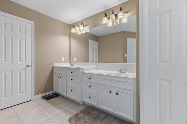 bathroom with vanity and tile patterned flooring