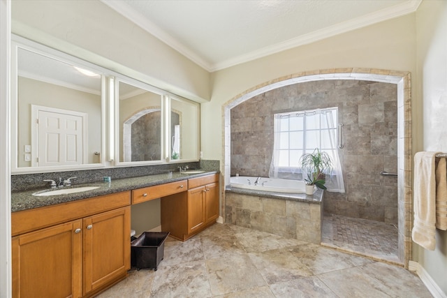 bathroom featuring vanity, crown molding, and independent shower and bath