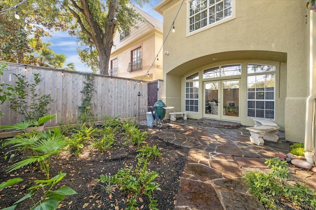 view of patio featuring french doors