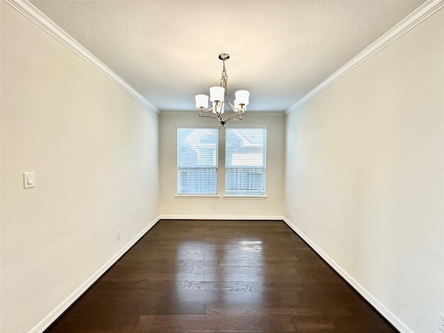 unfurnished dining area with crown molding, a textured ceiling, dark hardwood / wood-style flooring, and a chandelier