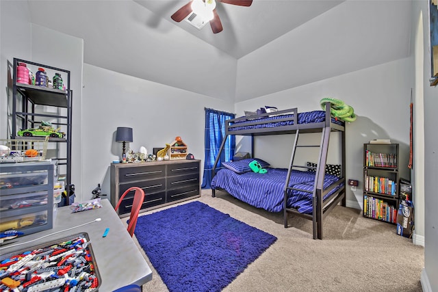 bedroom with carpet, ceiling fan, and lofted ceiling