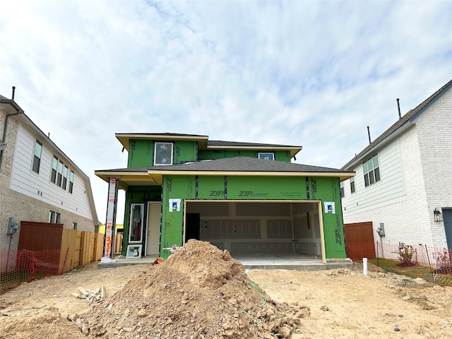 view of front of home with a garage