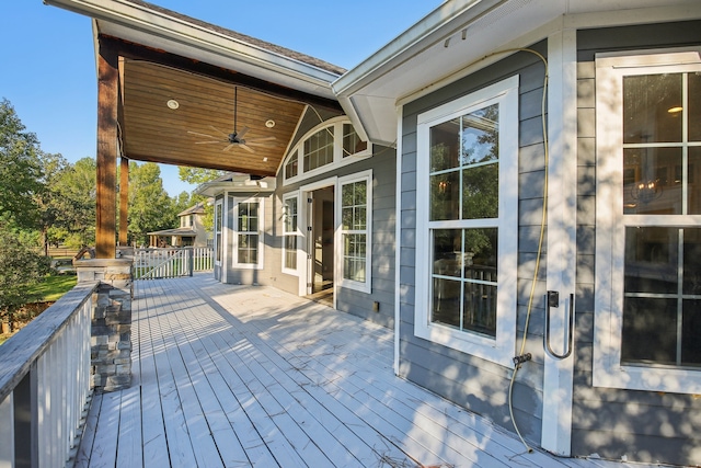 wooden deck with ceiling fan