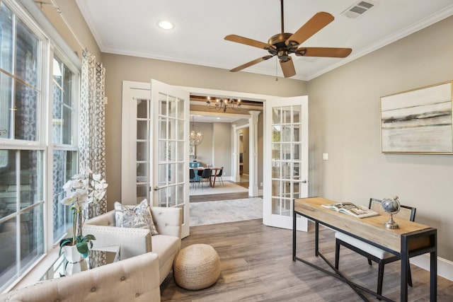 38134 Cascade Ct, Magnolia, TX 77354 - office with french doors, a chandelier, wood finished floors, ornamental molding, and a ceiling fan