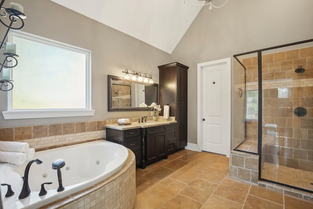 38134 Cascade Ct, Magnolia, TX 77354 - bathroom with a stall shower, a whirlpool tub, vanity, and high vaulted ceiling