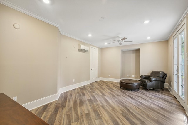 38134 Cascade Ct, Magnolia, TX 77354 - unfurnished room with a wall unit AC, wood finished floors, recessed lighting, ornamental molding, and ceiling fan