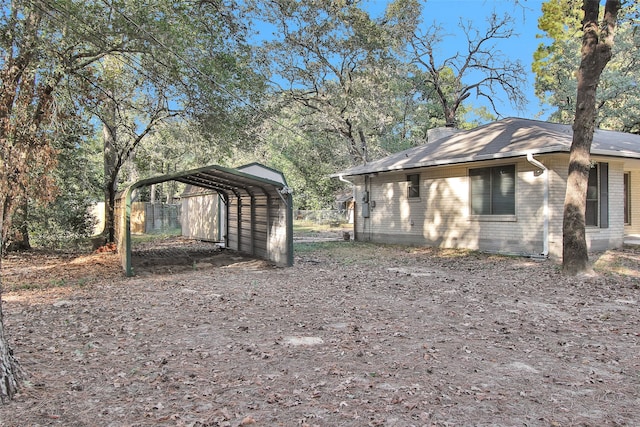 view of property exterior with a carport