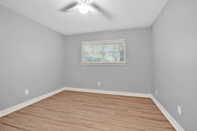 unfurnished room featuring ceiling fan and light wood-type flooring