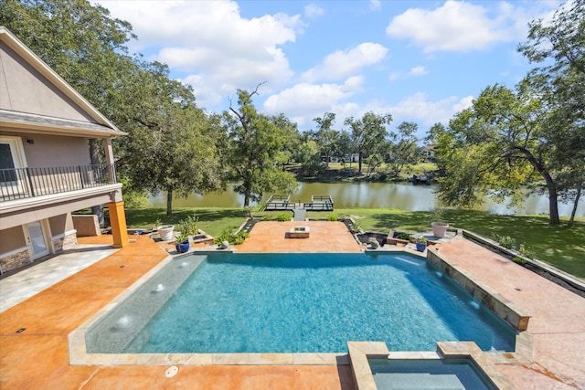 view of swimming pool featuring a water view and a patio area