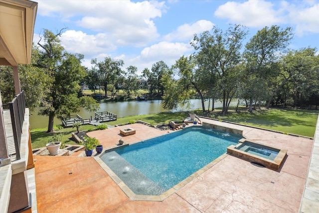 view of swimming pool featuring a patio, an in ground hot tub, a water view, and a lawn