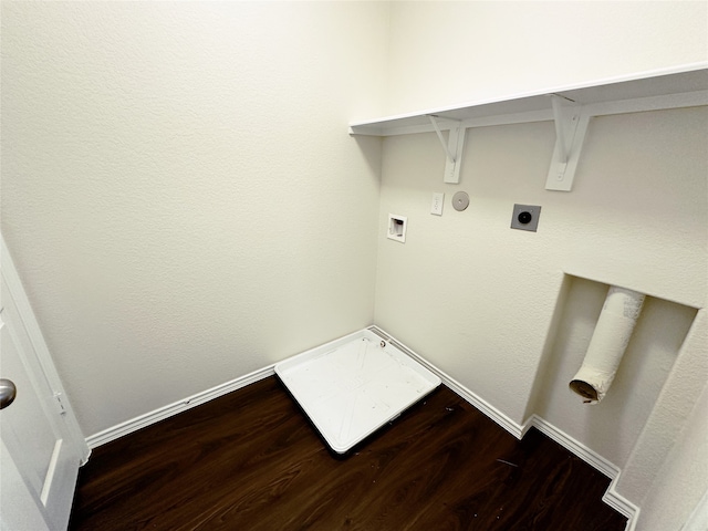 clothes washing area with hookup for an electric dryer, hookup for a washing machine, gas dryer hookup, and dark hardwood / wood-style flooring