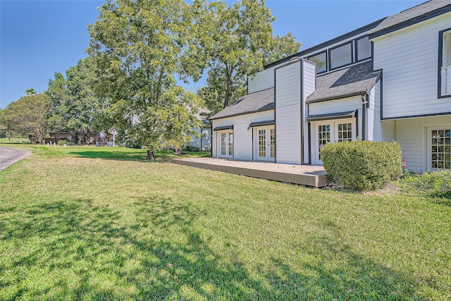 view of yard with french doors