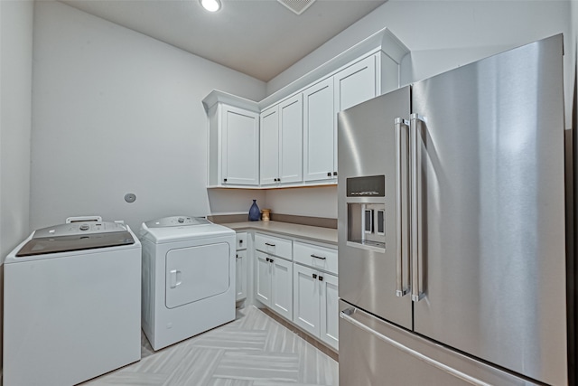 washroom featuring separate washer and dryer