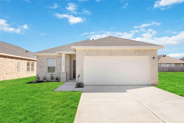 ranch-style house featuring a garage and a front lawn