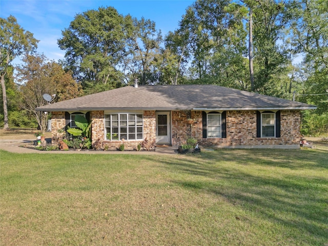 ranch-style house with a front lawn