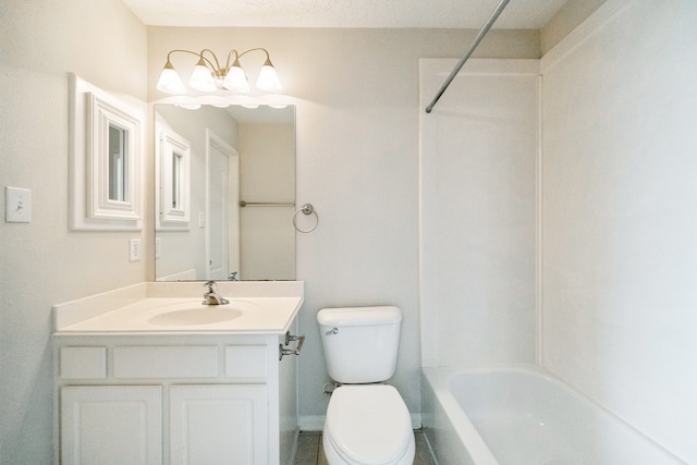 full bathroom featuring toilet, shower / bathing tub combination, vanity, and a textured ceiling