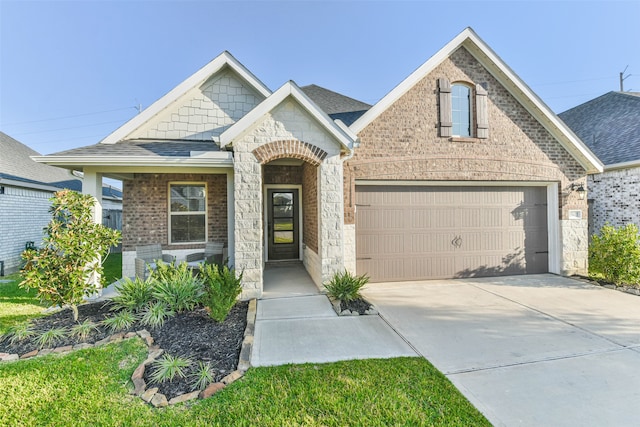 view of front of property featuring a garage