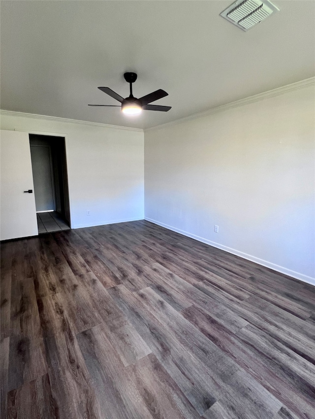 unfurnished room featuring ornamental molding, ceiling fan, and dark hardwood / wood-style flooring