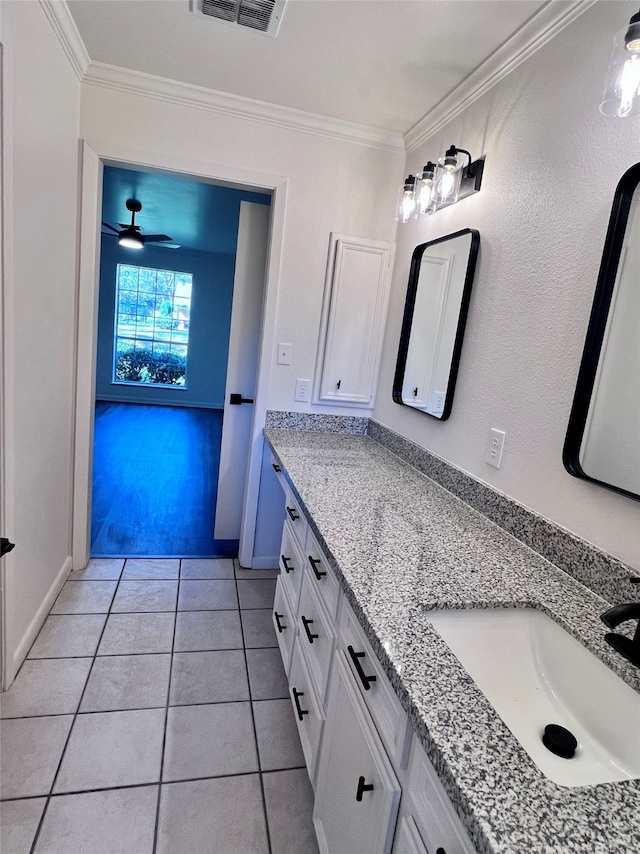 bathroom with vanity, ceiling fan, tile patterned floors, and ornamental molding