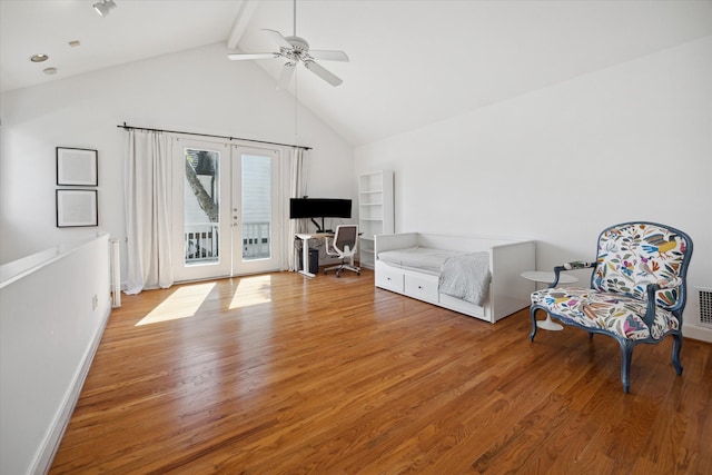 sitting room with high vaulted ceiling, french doors, ceiling fan, beam ceiling, and hardwood / wood-style flooring