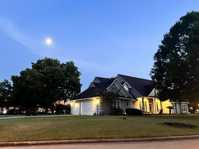 view of front of house with a lawn