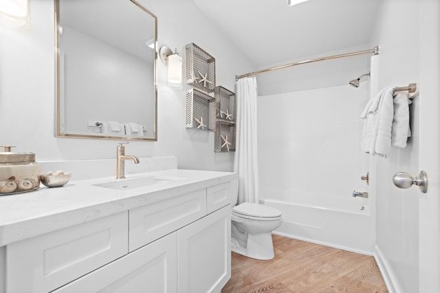 full bathroom featuring shower / bath combination with curtain, vanity, wood-type flooring, and toilet