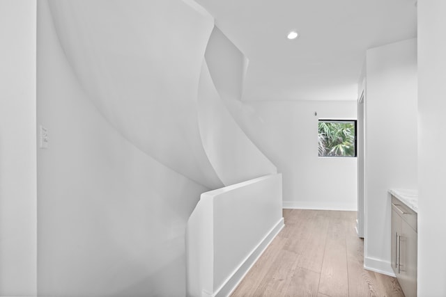 bonus room featuring light wood-type flooring