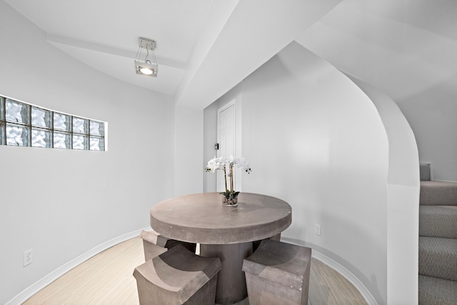 dining area with hardwood / wood-style flooring