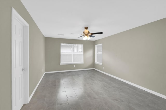 empty room featuring ceiling fan