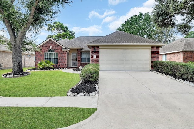 single story home featuring a front lawn and a garage