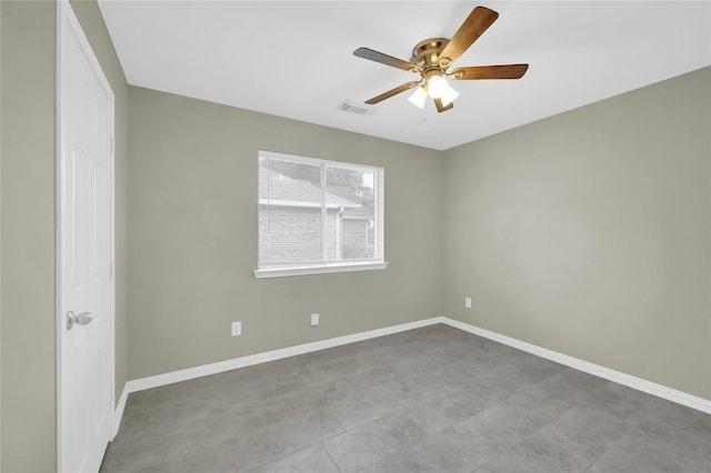 spare room featuring ceiling fan