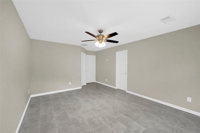 empty room featuring ceiling fan