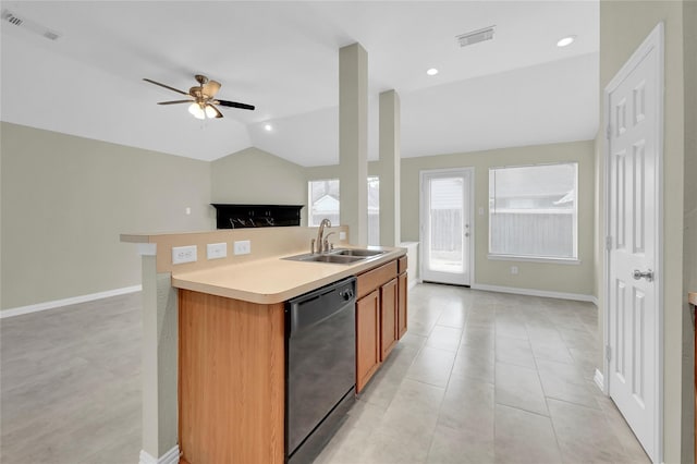 kitchen featuring black dishwasher, an island with sink, vaulted ceiling, light tile patterned flooring, and sink