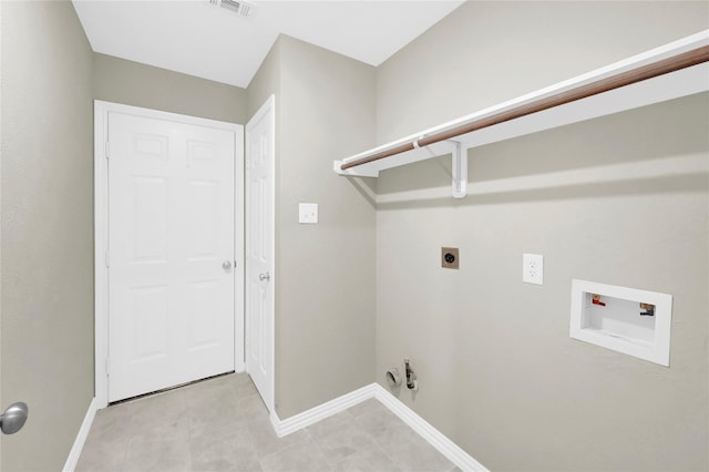 washroom featuring gas dryer hookup, hookup for a washing machine, and electric dryer hookup