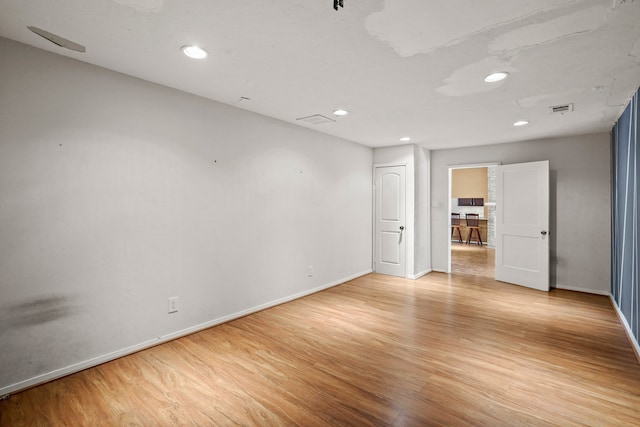 empty room featuring light hardwood / wood-style floors