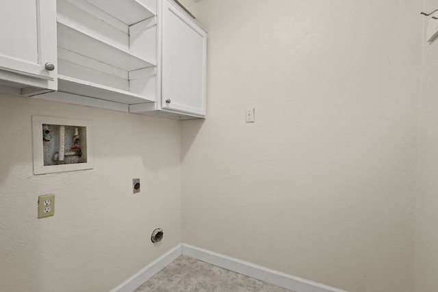 laundry room featuring cabinets, hookup for an electric dryer, and hookup for a washing machine