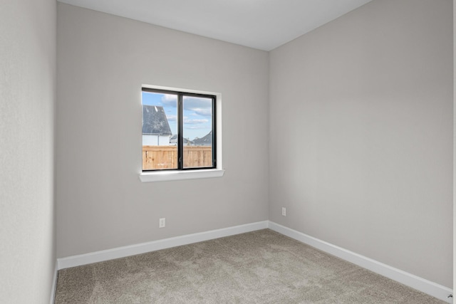 empty room featuring carpet flooring